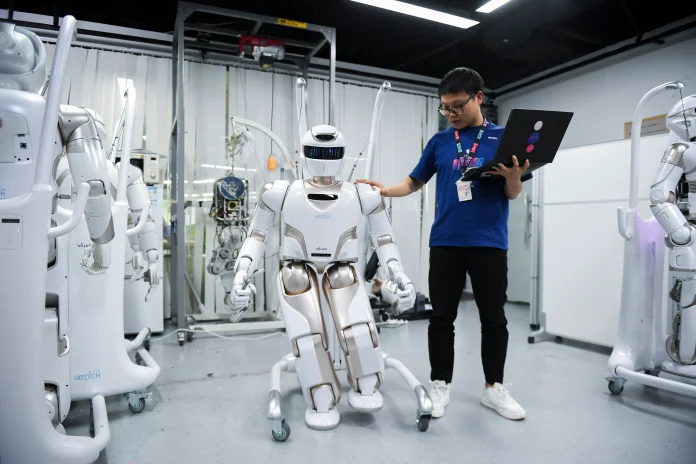 Guangdong Province is emerging as China's leading hub for embodied AI, with purpose-built robot training centers, industrial clusters in Shenzhen and Guangzhou, and companies like XPENG, BYD, and DJI driving deployment across manufacturing, healthcare, and urban management.