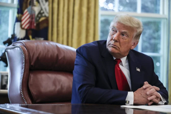 President Trump has postponed the signing of a major AI executive order, citing concerns that new security frameworks could hinder American AI developers in the race against China.