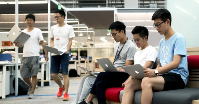 A TMT Post investigation into China's software engineering community reveals a stark divide: elite developers running hundreds of parallel AI agents, and traditionalists who refuse to let AI touch their code. The split is reshaping teams, salaries, and the future of the profession.