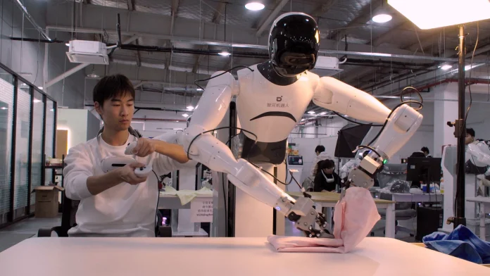 China is rapidly expanding a network of humanoid robot data training centers, where human instructors teach AI-powered machines to perform complex physical tasks, accelerating the commercialization of embodied AI.