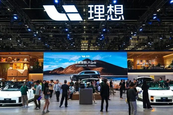 Li Auto reported a record $340 million quarterly loss as China's brutal EV price war squeezes margins, prompting the company to raise its international expansion stakes.